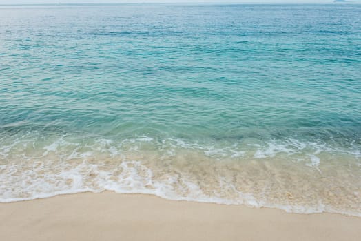 Beautiful beach on the gulf of Rayong, Thailand, taken on a sunny day.