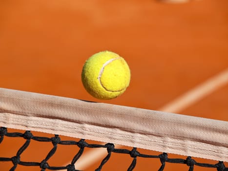 tennis ball over the net