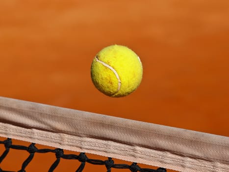 tennis ball fly over the net