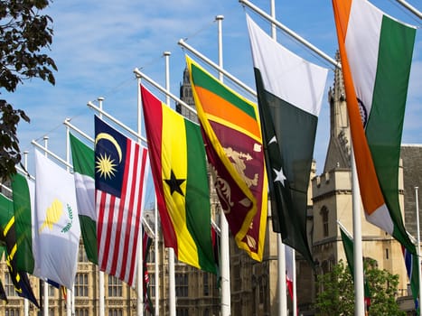 different state flags infront of  House of parliament in London UK