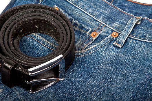 blue jeans and brown belt 