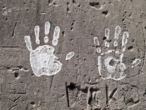 painted hands on the wall