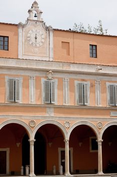 An old pink building in Pisa
