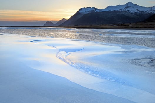 Ice shapes in the east fjords iceland at sunset in winter