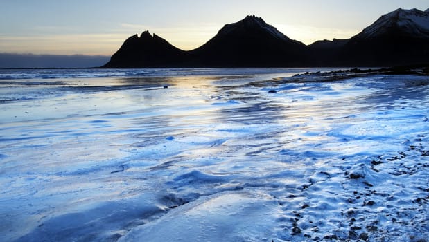 Ice shapes in the east fjords iceland at sunset in winter