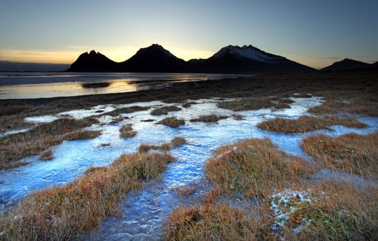 Ice shapes in the east fjords iceland at sunset in winter