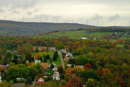 Fall color landscape in rural America with windmills