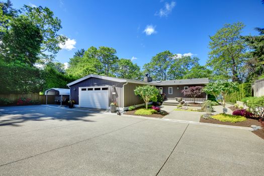 Beautiful home with garage, lake view and large front yard.