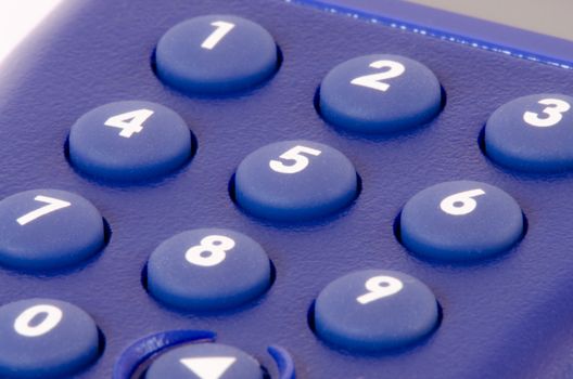 close-up of a blue dial pad with numbers