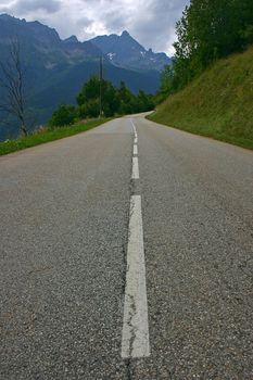 Long road travelling up in the mountains