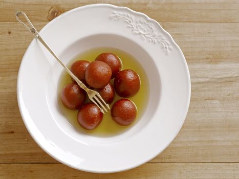 close up of indian dessert gulab jamun