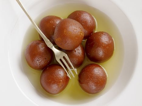 close up of indian dessert gulab jamun