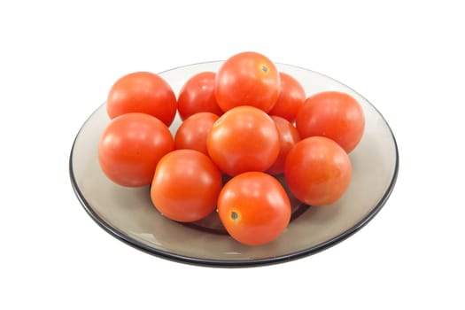 Closeup of some tomatoes on a glass plate