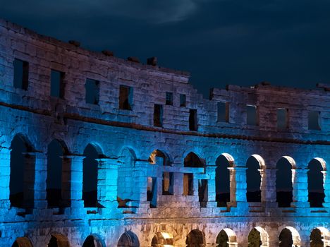 old amphitheater under bright lights