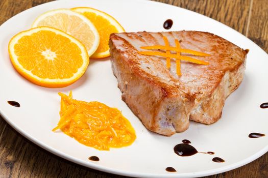 fried tuna fillet with fresh orange and orange sauce