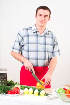 portrait of a man, cut vegetables, make meal