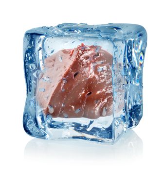 Ice cube and liver isolated on a white background