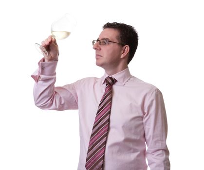 Portrait of a man with tie tasting a glass of white wine