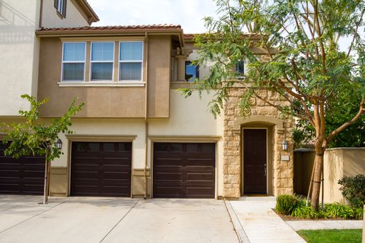 A condo in Southern California has doors that open to a courtyard type entryway.