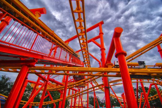 Rollercoaster in amusement park in summer