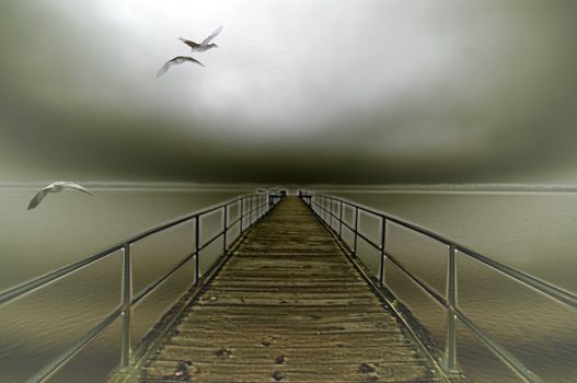 Moody picture of the outer banks Beach fishing pier at dawn