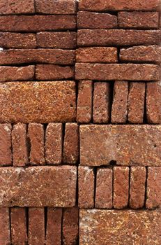 Pattern, Texture, Background of Red-brown Laterite bricks.