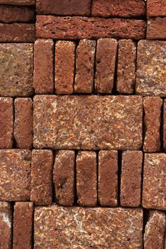 Pattern, Texture, Background of Red-brown Laterite bricks.