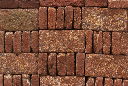 Pattern, Texture, Background of Red-brown Laterite bricks.