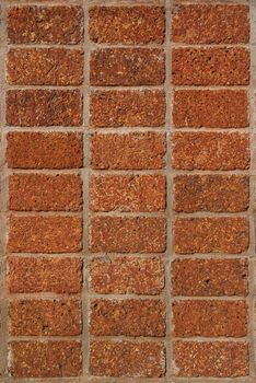 pattern red - brown color of modern style design decorative laterite stone wall surface with cement 
