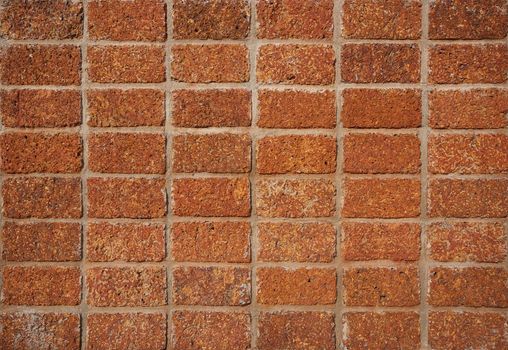 pattern red - brown color of modern style design decorative laterite stone wall surface with cement 
