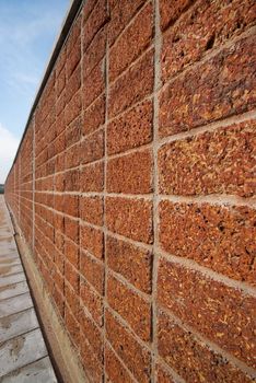 pattern red - brown color of modern style design decorative laterite stone wall surface with cement 
