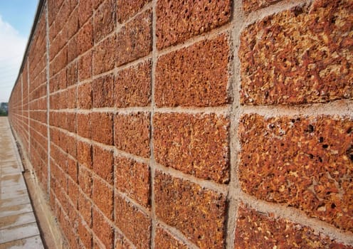 pattern red - brown color of modern style design decorative laterite stone wall surface with cement 
