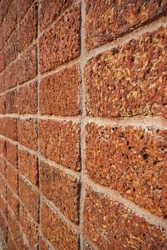 pattern red - brown color of modern style design decorative laterite stone wall surface with cement 
