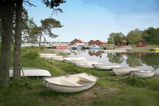  small boats park in ocean bay