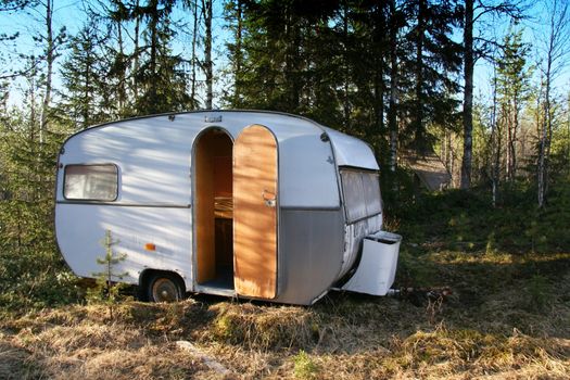 Vintage caravan in the forest