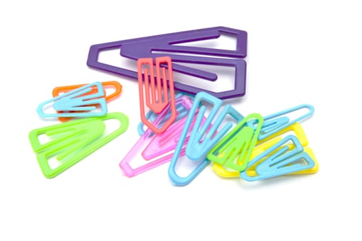 Colorful paper-clips isolated on white backgorund 
