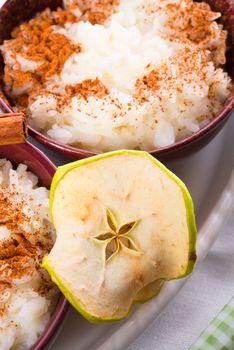 milk rice with cinnamon and applesauce