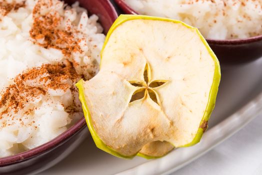 milk rice with cinnamon and applesauce