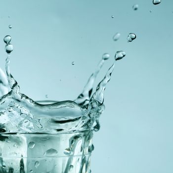 super splash in glass on white background