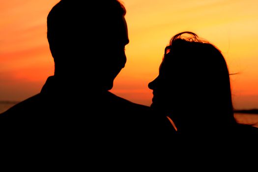 relax on gold sunset  romance flirt of two person on vacation