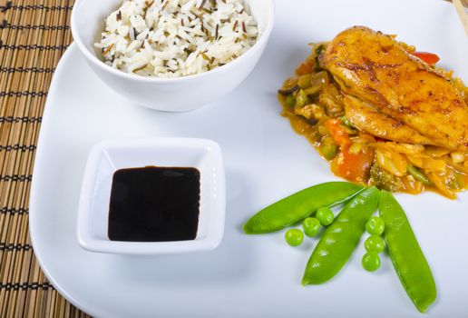 Chickens with vegetables, rice and soy sauce