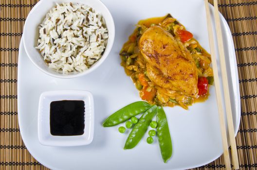 Chickens with vegetables, rice and soy sauce