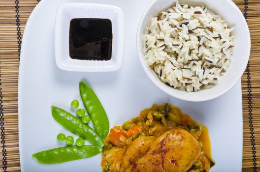 Chickens with vegetables, rice and soy sauce