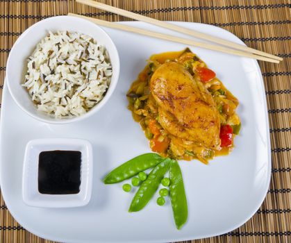 Chickens with vegetables, rice and soy sauce