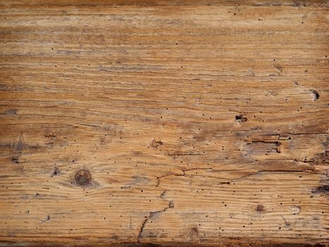Photo of an old wood plank taken from a rotting barn.