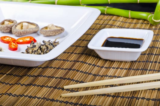 Rice and mushroom and Shiitake has young zwibel on plate with Mu Err