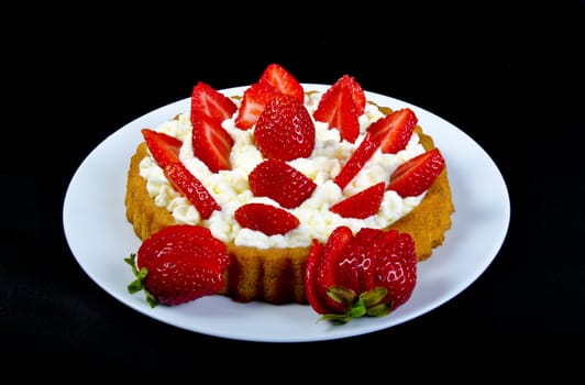 Fresh summery strawberry cake with white cream