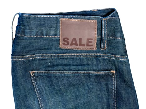 Sale - Pocket of Jeans With Sale Sign on Badge