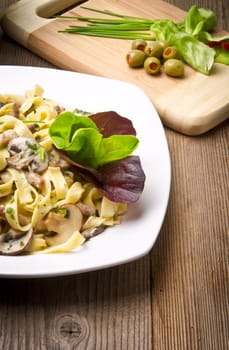 Tagliatelle with tail steak stripe and champignons