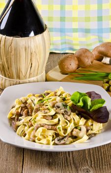 Tagliatelle with tail steak stripe and champignons